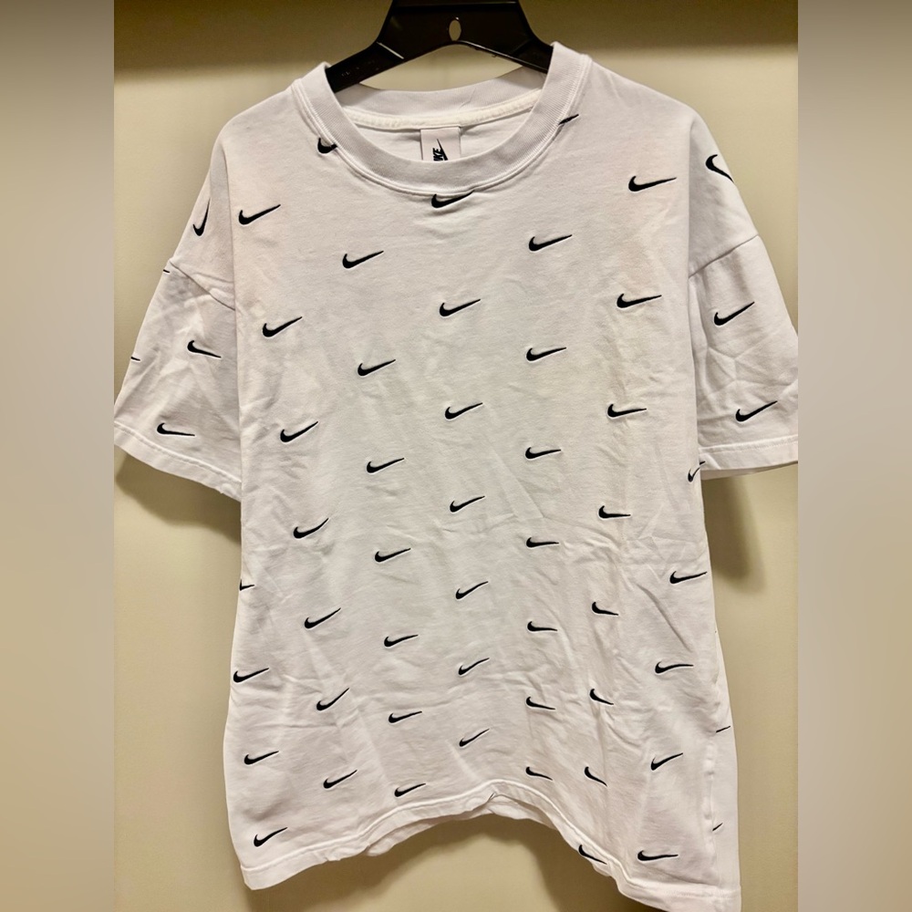 Nike White Tee with Black Swoosh Design